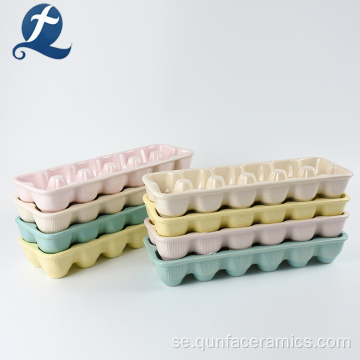 Färgglad fläckig keramisk äggplatta